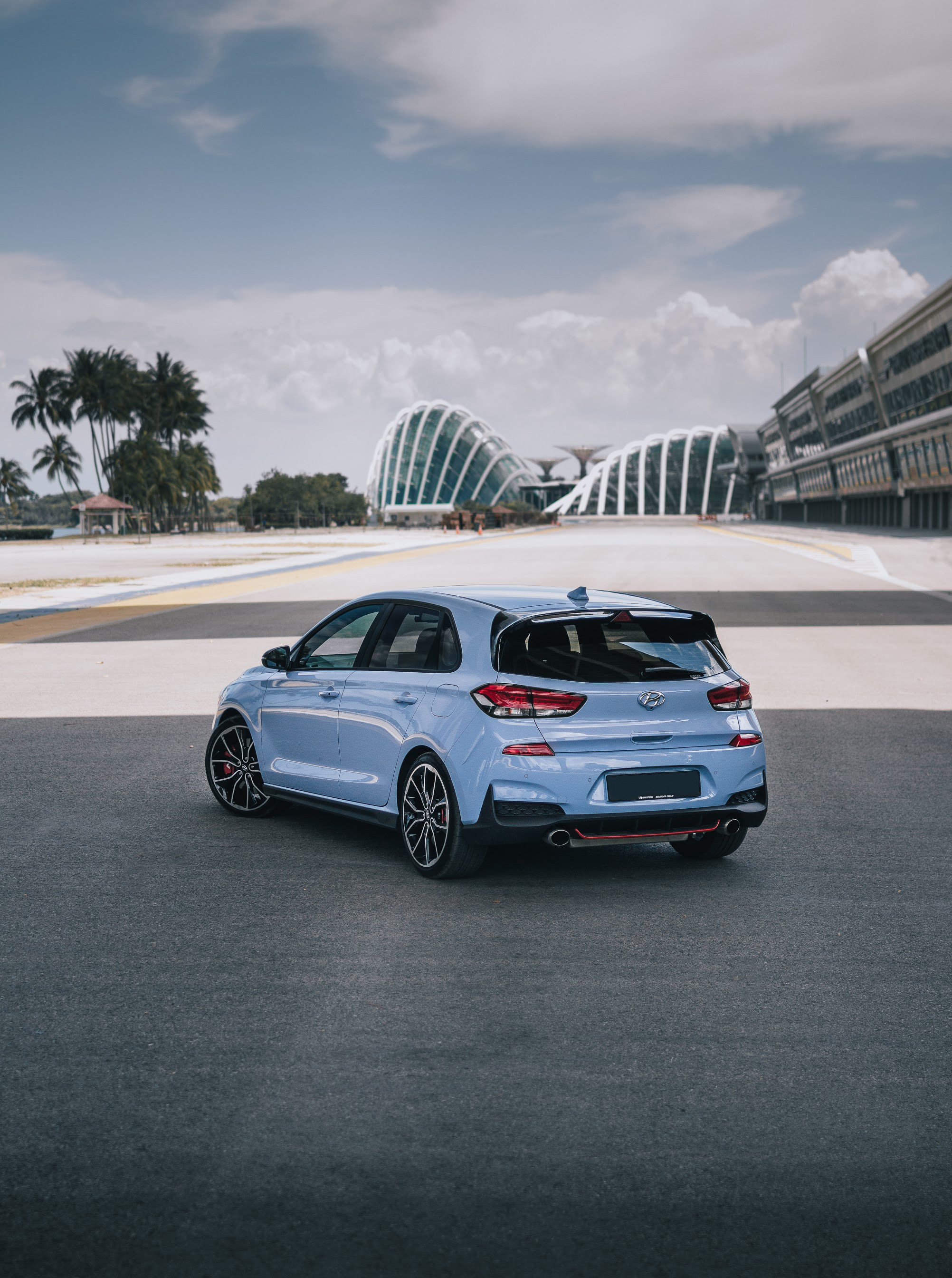 i30 N at Marina Bay circuit's main straight, Singapore, with Gardens by the Bay in the background