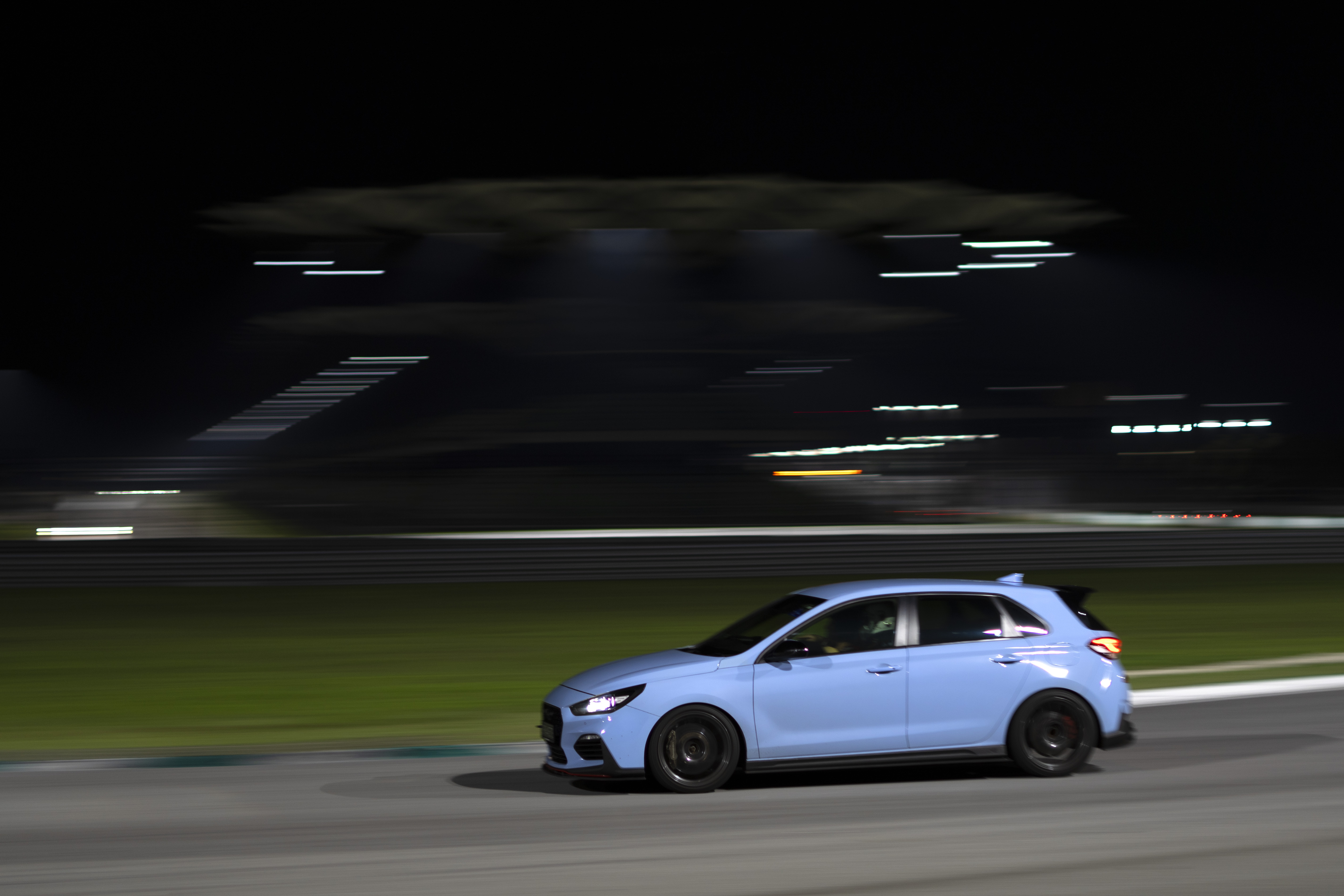 Night panning shot under floodlights